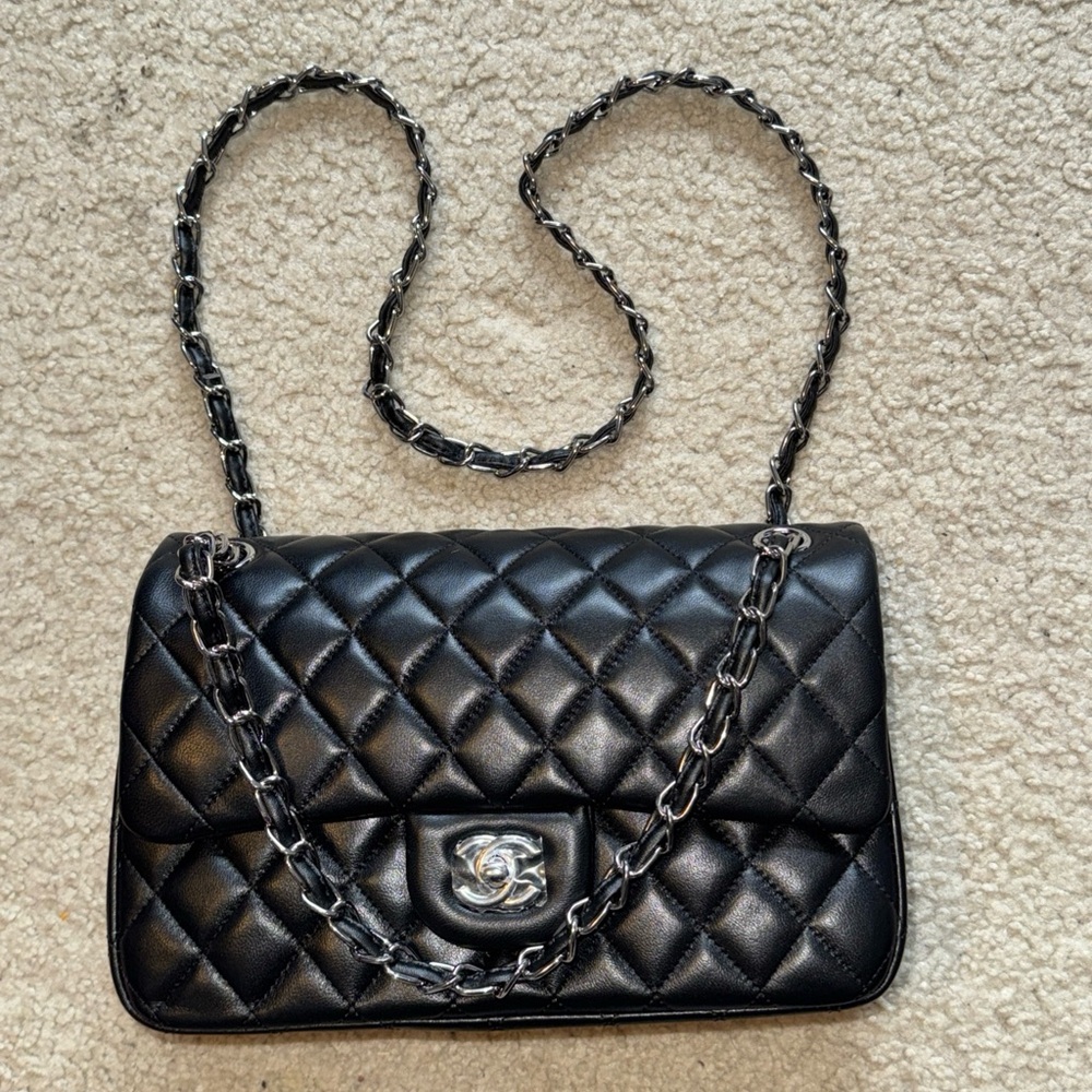 CHANEL Classic Red Interior Flap
Bag Maxi Black Leather